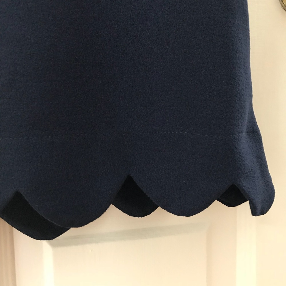 Navy dress with scallop hem